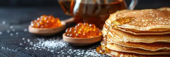 fried pancakes with red caviar photo