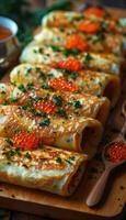 fried pancakes with red caviar photo