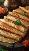 fried pancakes with red caviar photo