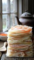 fried pancakes with red caviar photo