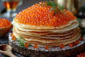 fried pancakes with red caviar photo