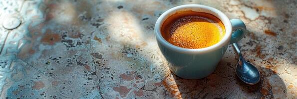 Enjoy the rich aroma of coffee in a charming blue cup on a rustic wooden table for your morning photo