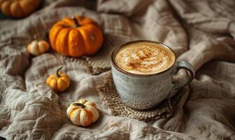 A cappuccino with a side of pumpkin slices photo