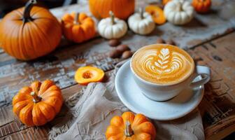A cappuccino with a side of pumpkin slices photo