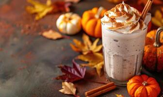 A pumpkin spice latte with a drizzle of caramel photo