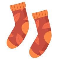 Cute socks with a fall pattern in a flat style. vector