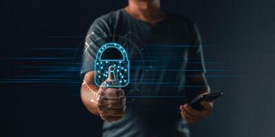 Cyber security and privacy protection network security computer and safe data concept. Businessmen protect personal data information from viruses on a laptop with virtual screen interfaces. photo