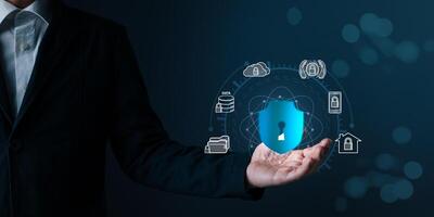 Cyber security and privacy protection network security computer and safe data concept. Businessmen protect personal data information from viruses with virtual screen interfaces. photo