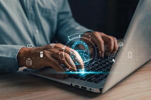 Cyber security and privacy protection network security computer and safe data concept. Businessmen protect personal data information from viruses on a laptop with virtual screen interfaces. photo