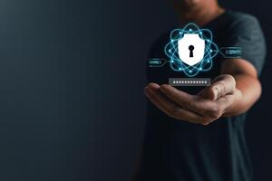 Cybersecurity and privacy protection network security computer and safe data concept. Businessmen protect personal data information from viruses on a laptop with virtual screen interfaces. photo