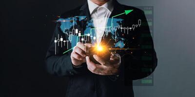 business online market.man draw graphs and progress of business and analyze financial,and investment.Use technology to plan strategy to success goals and growth stock.e-commerce. photo