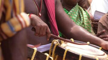 Artists playing Chenda, a South Indian traditional musical instrument photo