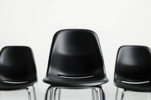 Black chairs standing in empty room waiting for meeting photo