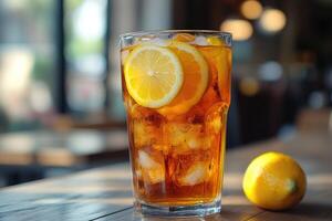 Refreshing iced tea with lemon slice in a cafe setting photo