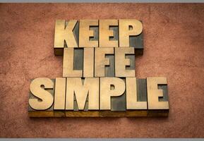 keep life simple - inspirational word abstraxt in vintage letterpress wood type, simplicity and lifestyle concept photo