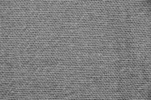 Blue cloth macro view. Black and white monochrome grayscale photo background.