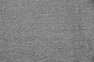 Blue cloth macro view. Black and white monochrome grayscale photo background.