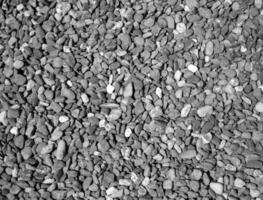 Stone ground pattern, natural stone texture, ground pavement background. Black and white photo background