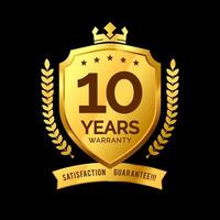 label 10 years warranty protective icon badge . design the shape of a golden shield with a king's crown. illustration eps 10 vector