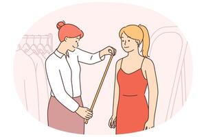 Seamstress measure client in atelier vector