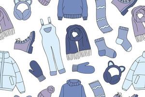 Warm autumn and winter clothes seamless pattern in doodle style. collection vector