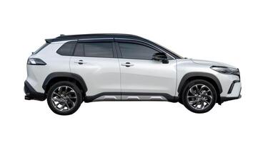 Side view of white hatchback car isolated on white background with clipping path photo
