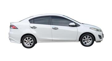 Side view of white sedan car isolated on white background with clipping path photo