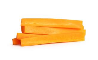 Side view of fresh orange carrot slices or pieces in stick shape in stack isolated on white background with clipping path photo