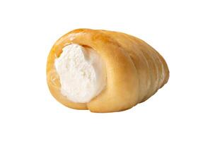 Front view of puff pastry cream horn isolated on white background photo