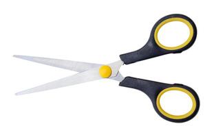 Top view of pair of multipurpose scissors with black and yellow handle isolated on white background with clipping path. photo