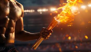 hand holding torch with burning flame photo