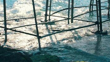 Waves Crashing Against Metal Structure video
