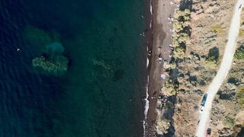 Aerial view of a road by the beaches of Santorini video