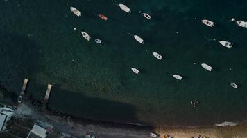 Aerial footage of boats on a bay in Santorini Island video