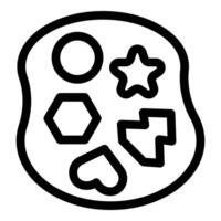 Cookie cutters set lying on table in bakery vector