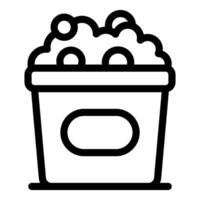 Full popcorn bucket is overflowing for movie watching snack vector
