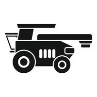 Big combine harvester working in field at sunset vector