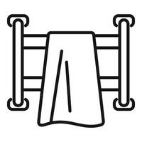 Towel drying on heated towel rail in bathroom vector