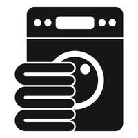 Washing machine with stack of towels for laundry service icon vector