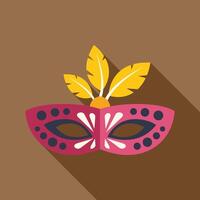 Pink carnival mask with feathers is lying on the table vector