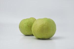 Fresh green guava is on an isolate white background photo