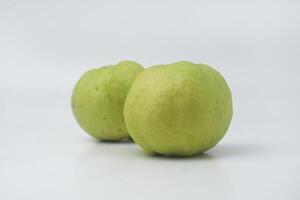 Fresh green guava is on an isolate white background photo