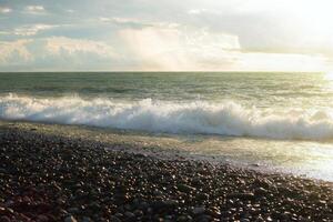 View of the sea in the evening. Sunset sky with beautiful clouds. photo