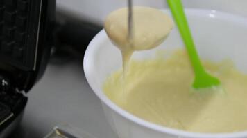 Drizzle caramel over waffles process of making waffles. Belgian waffles cooking process Bake waffles video