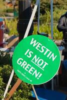 Vancouver, Canada - September 27,2019 View of sign Westin is not Green on Cardero Street in front of Westin Hotel. Striking hotel workers block street in downtown Vancouver photo