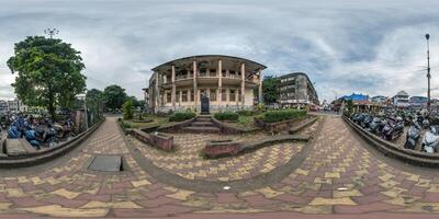 seamless spherical hdri 360 panorama in center of Indian city with a lot of traffic and parking with huge number of bikes in equirectangular projection photo