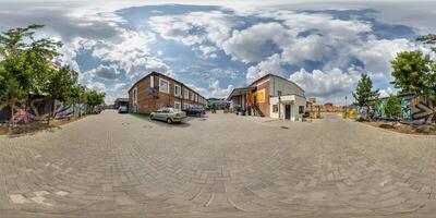 full seamless spherical hdri 360 panorama near old houses in narrow courtyard or backyard of city bystreet in equirectangular projection, for VR AR content photo