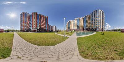 hdri panorama 360 near skyscraper multistory buildings of residential quarter complex in full equirectangular seamless spherical projection photo