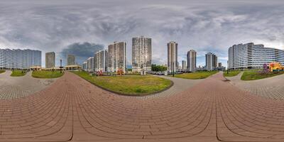 hdri 360 panorama near new skyscrapers and residential complex before storm with dark sky in full equirectangular seamless spherical projection photo