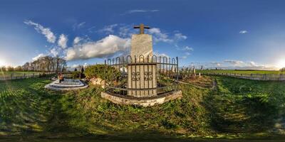 360 hdri evening panorama on old graveyard cemetery with gravestones and monuments at sunset in full equirectangular seamless spherical projection with zenith, VR content photo